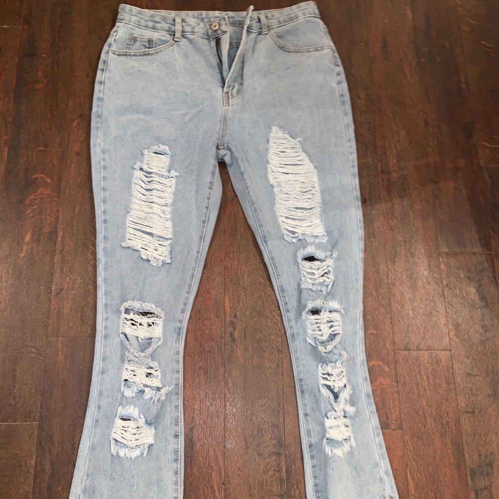 Light blue ripped jeans